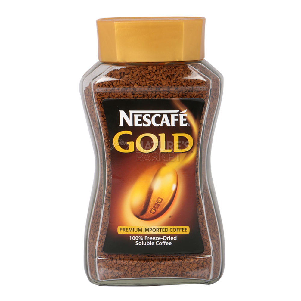 Кофе gold купить. Nescafe Gold Premium Blend. Nescafe Gold порошковой кофе. Nescafe Gold пудра. Кофе Нескафе Голд с орехом.