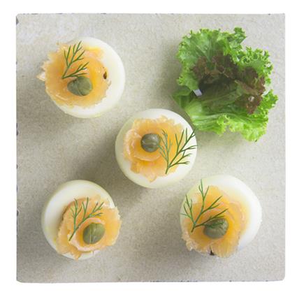 Achari Salmon And Olive Stuffed Eggs - Natures Kitchen